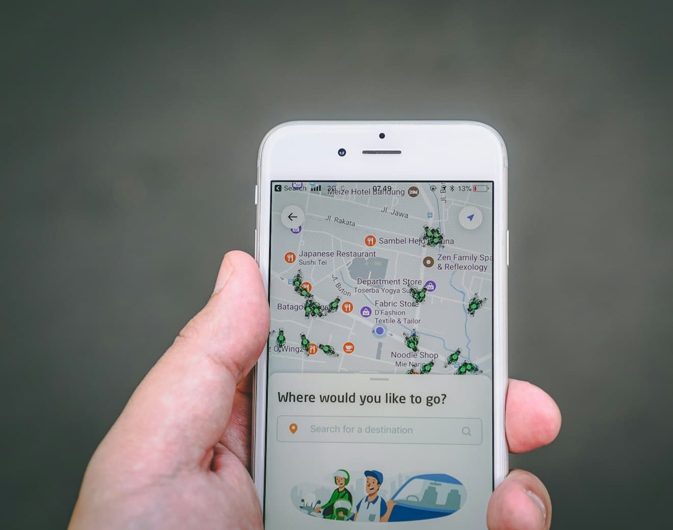 A traveller using a map app on a phone
