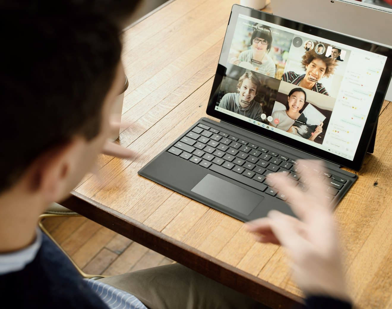 A distributed team meeting over a video call