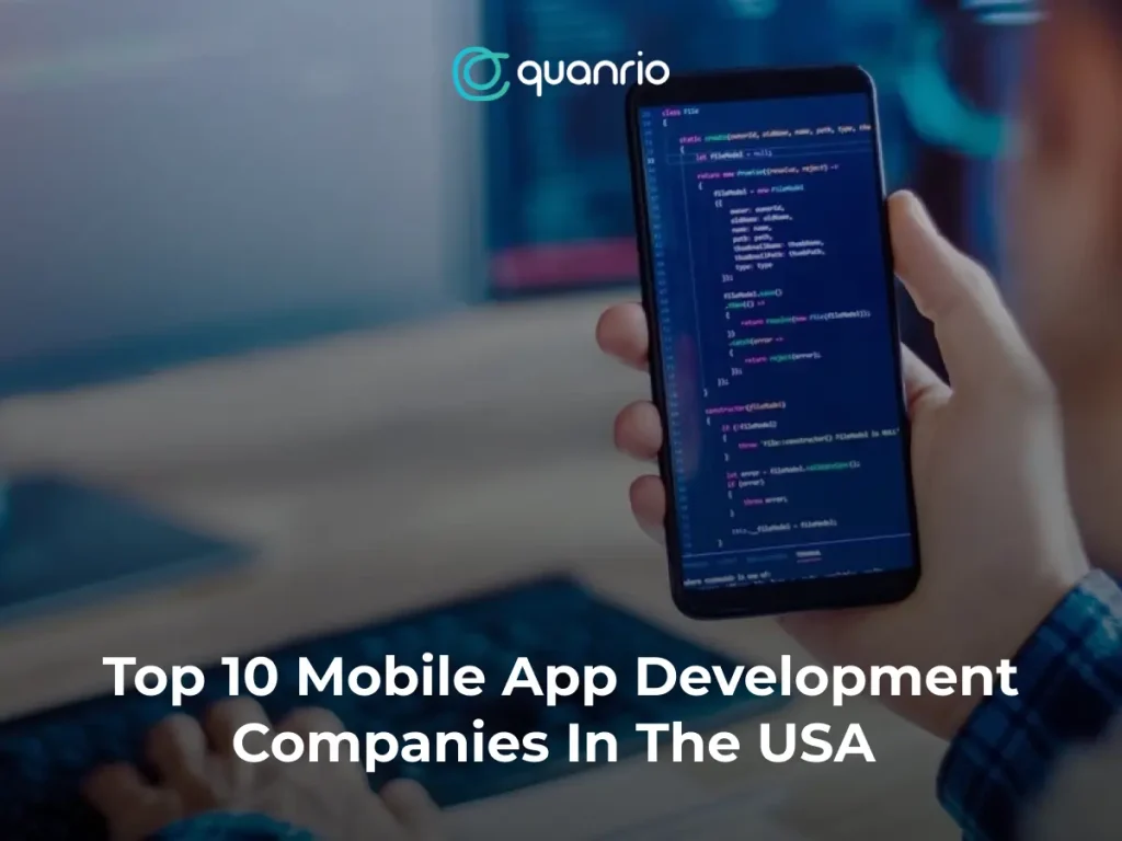 A person holding a smartphone displaying code, with the text "Top 10 Mobile App Development Companies In The USA" and the logo "quonrio" at the top.