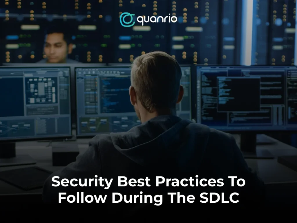 A person working at a desk with two monitors and a laptop displaying code and data visualizations, with the text "What's The Big Deal About SDLC In Software Development?" and the logo "Quanrio" at the top.